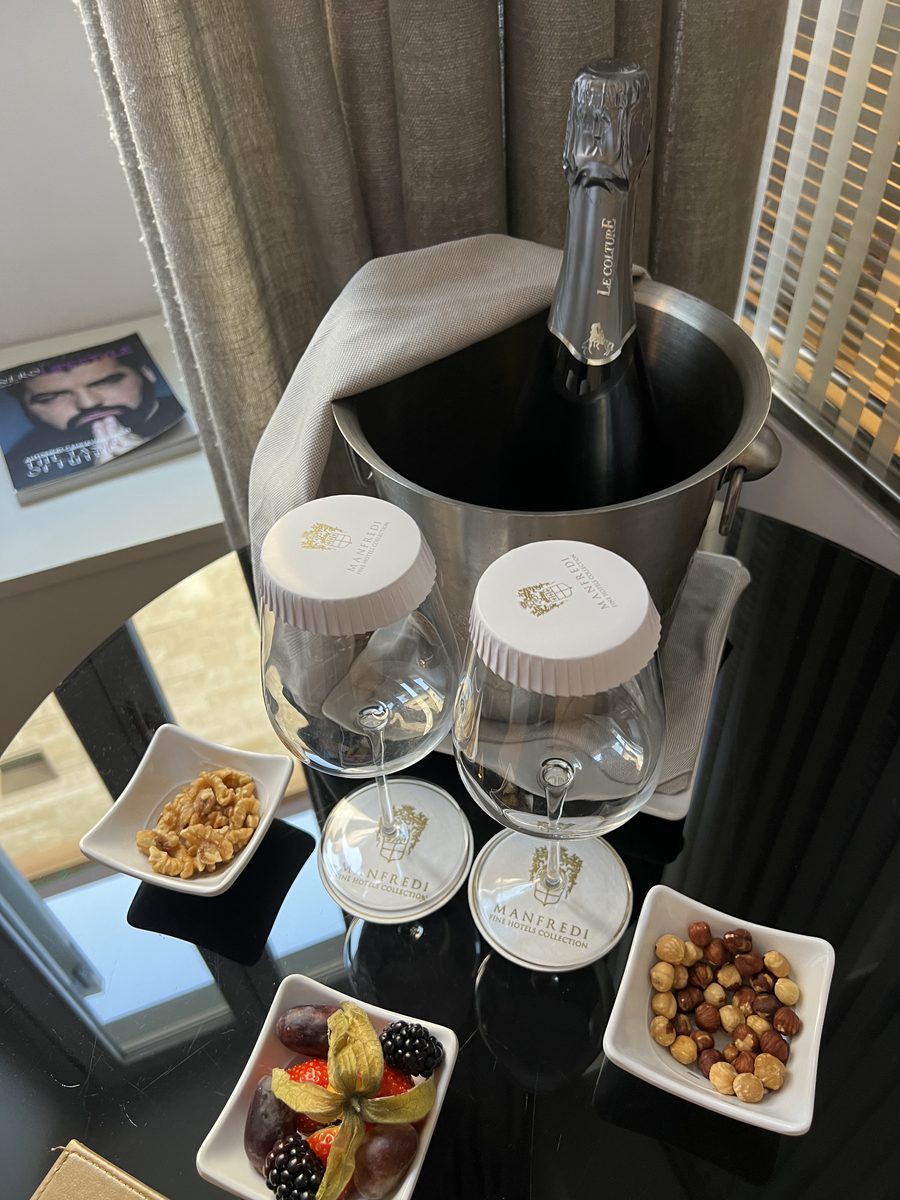 Welcome champagne, nuts and berries in our room at Palazzo Manfredi