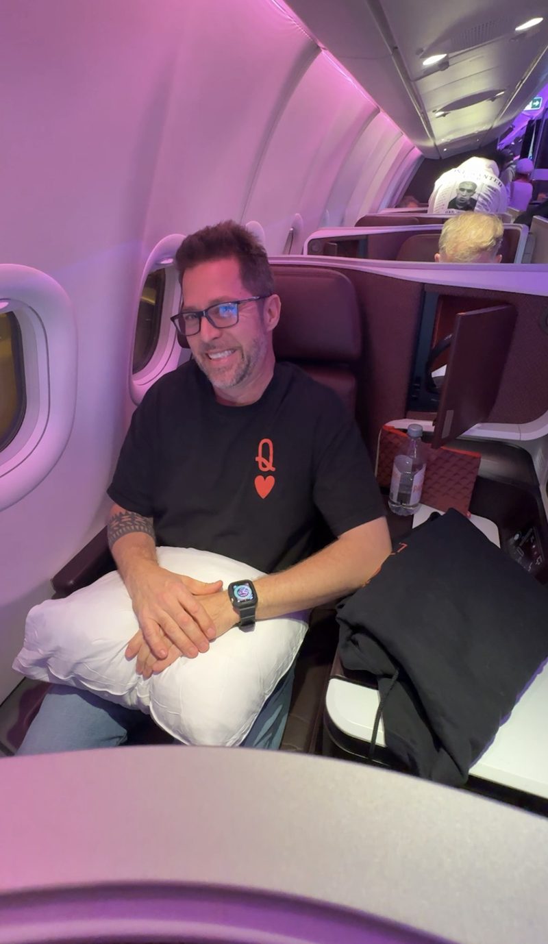 Settling into a Virgin Atlantic Upper Class suite with a pillow and blanket