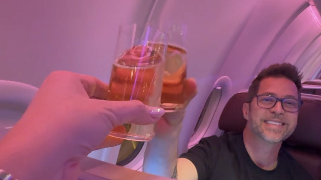 Champagne toast in Virgin Atlantic Upper Class on our flight from Tampa to London