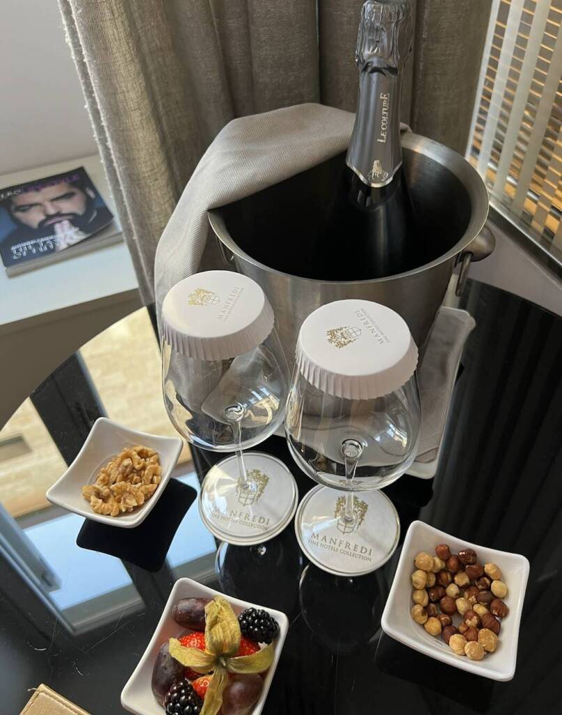 Champagne and snacks waiting in a boutique hotel room in Rome